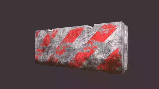 old concrete road block barrier with red paint chipped and dirt