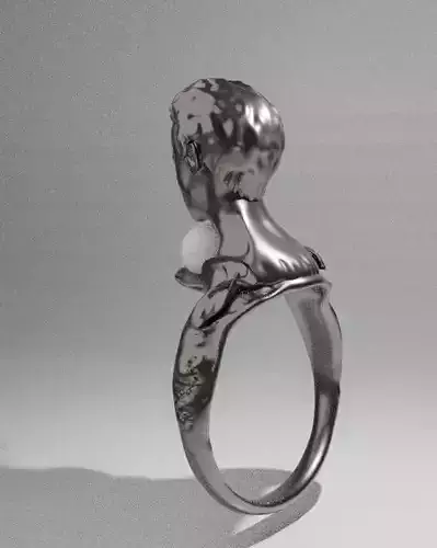 A gold ring containing the head of a child from Apocidonia