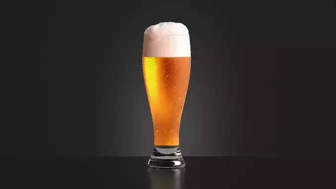 Beer Glass on dark background - drinking glas with drops