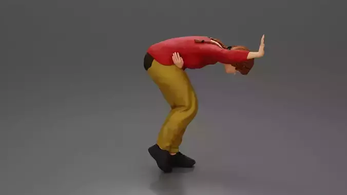 girl holding her stomach placing her hand on the wall