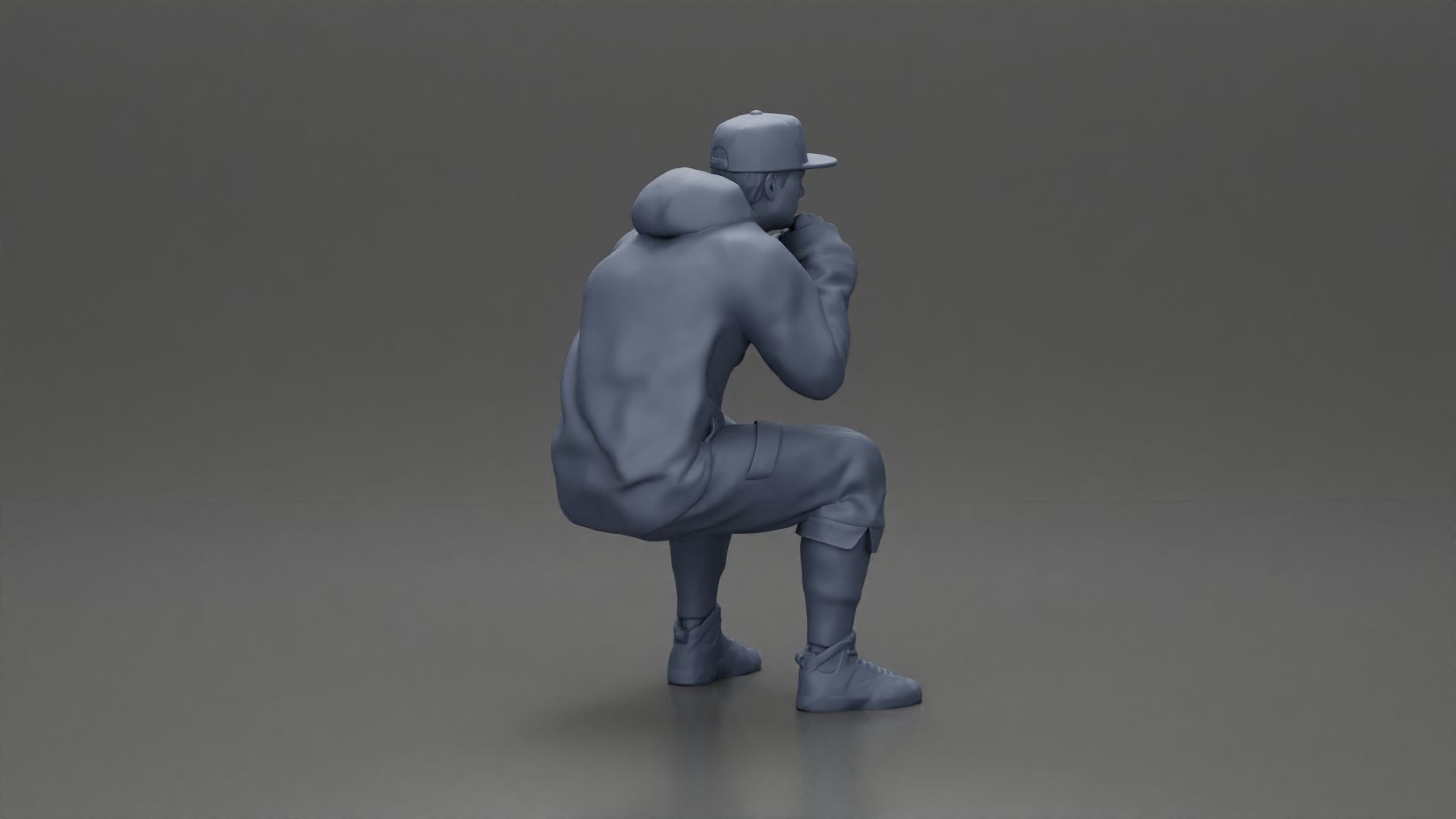 man in hoodie and cap sitting putting his hand on the skateboard 3D print model_21