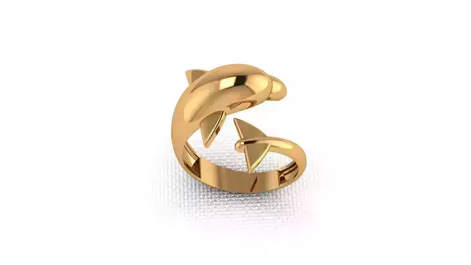 A golden ring in the shape of a dolphin