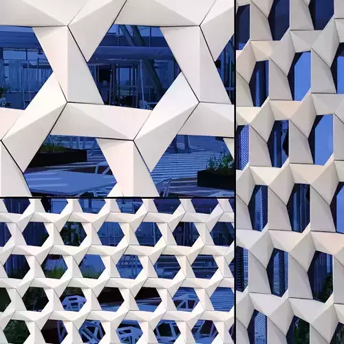 GRC Stars facade panels on a reflective blue glass