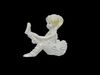 Porcelain Child Ballerina preparing for ballet Free low-poly 3D model_1