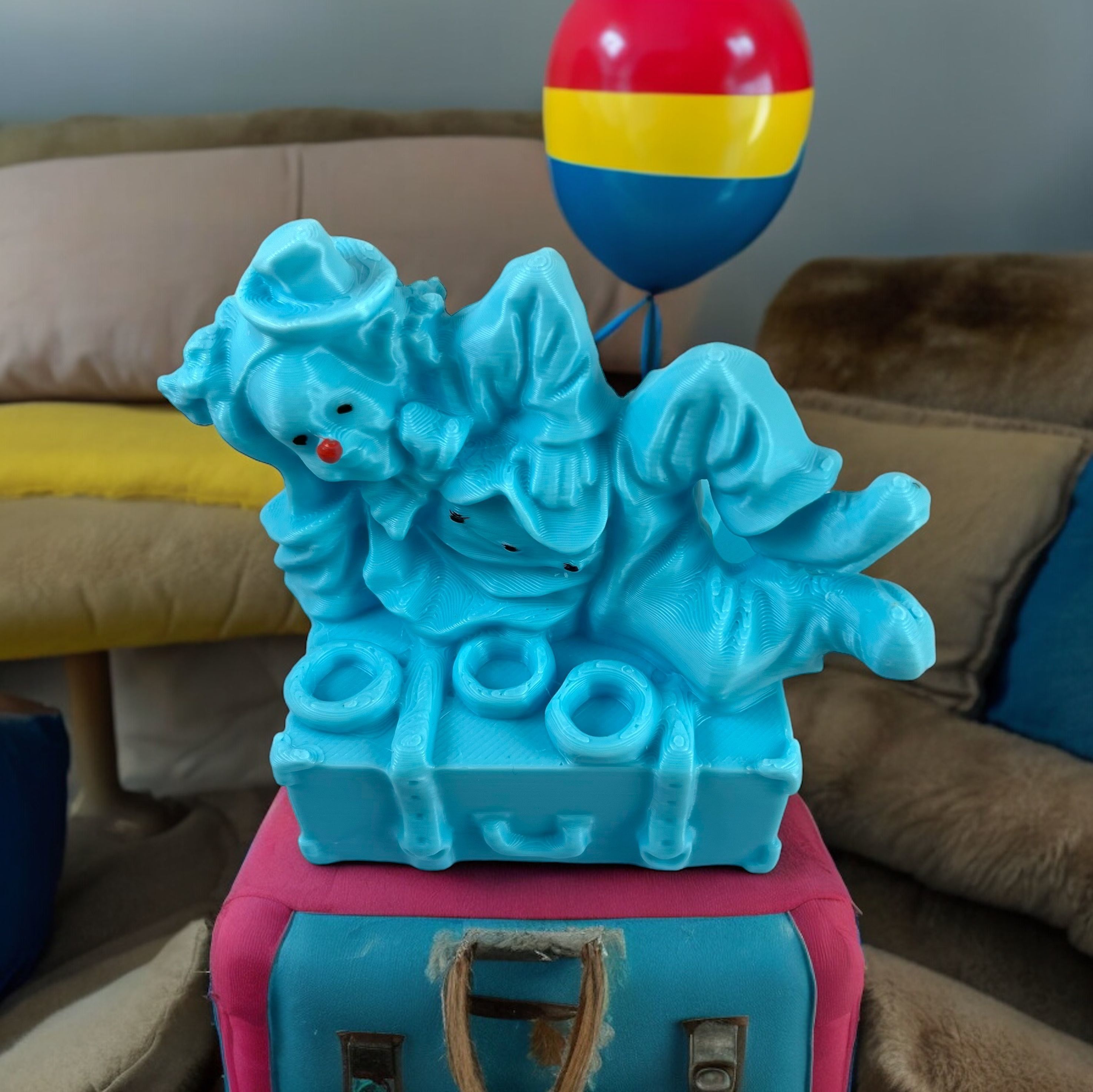 Clown lying on a suitcase 3D print model_1