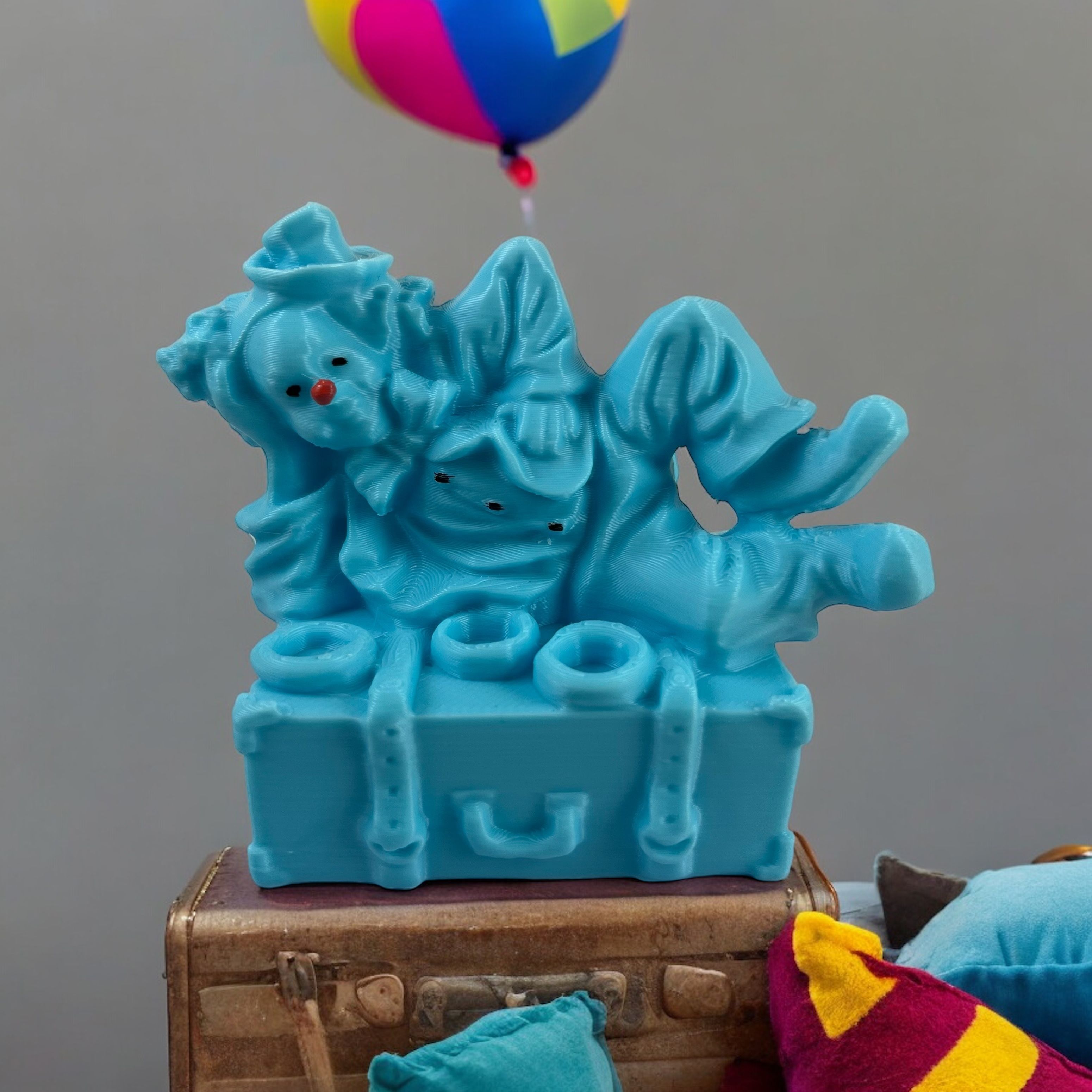 Clown lying on a suitcase 3D print model_5