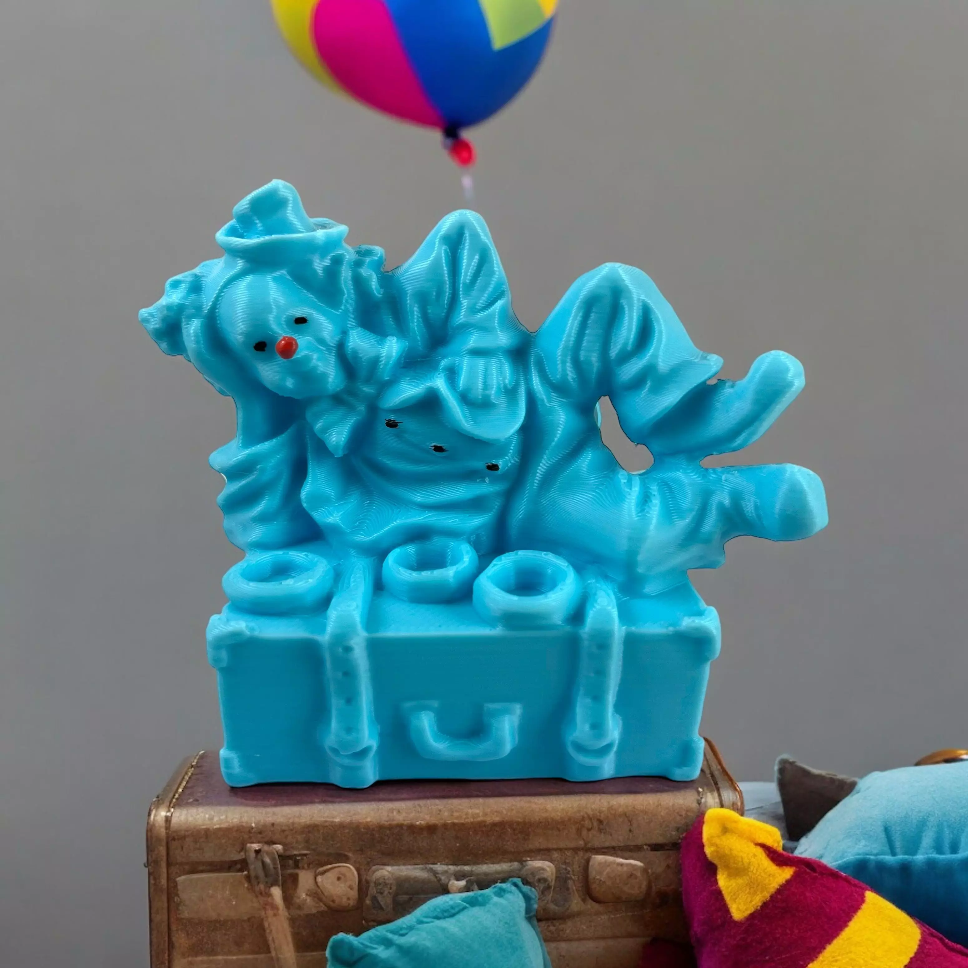 Clown lying on a suitcase 3D print model_0