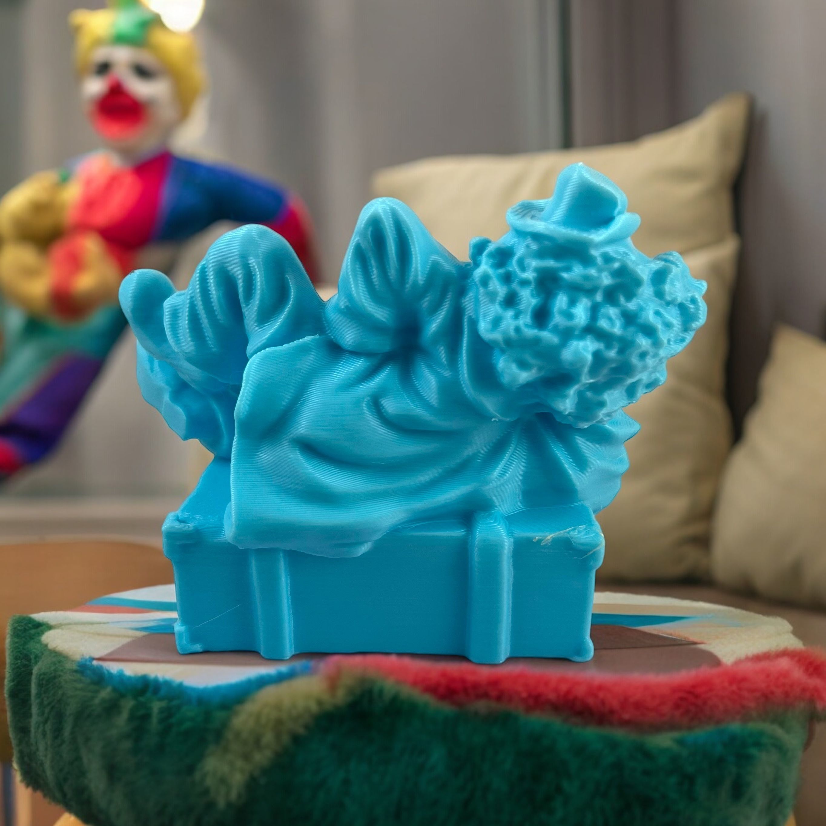 Clown lying on a suitcase 3D print model_3