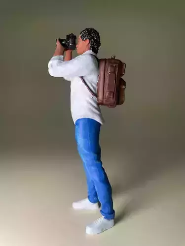 Travel photographer figurine with photo camera HighPoly