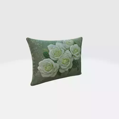 green pillow with white roses and green leaves