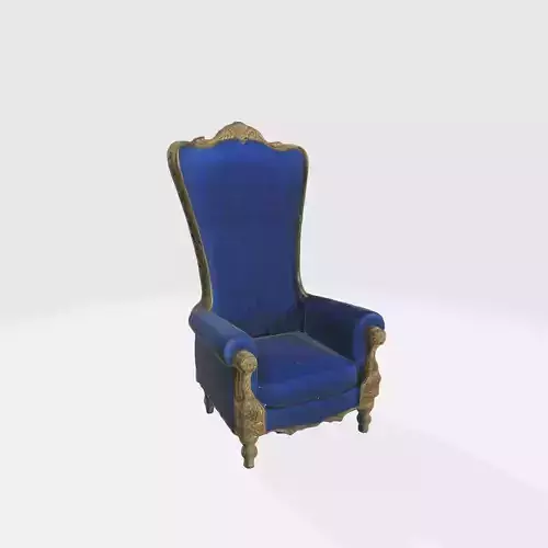 A blue velvet armchair with ornate wooden