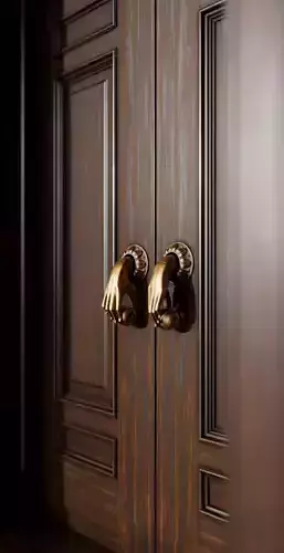 A doorknob shaped like a human hand