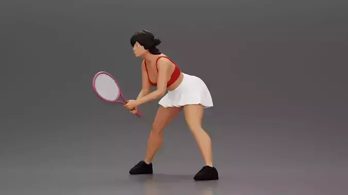 Sexy tennis player in skirt holding racket in a ready position