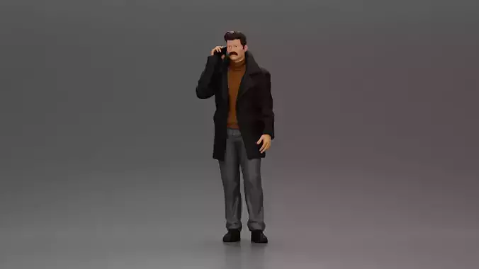 Turkish man in coat with sweater standing talking on mobilephone