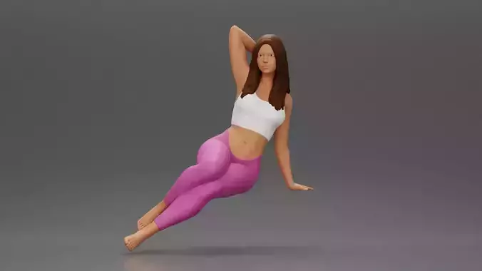 Fit girl in leggings sitting on a sofa