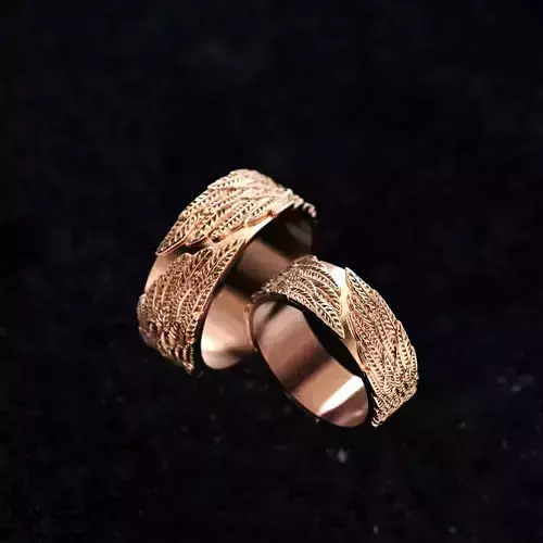 A ring with a feather texture