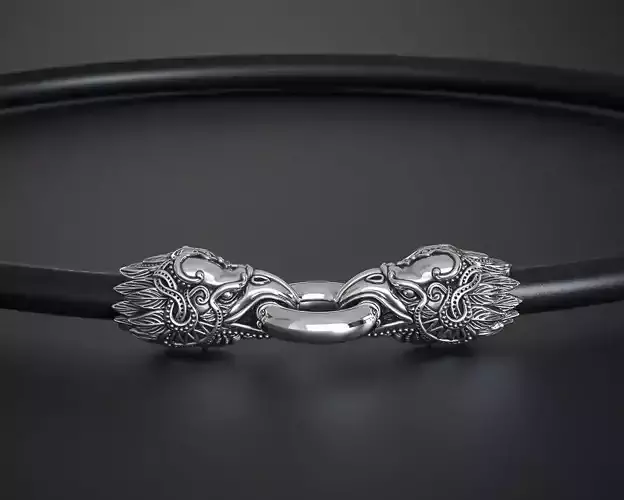 THE END CAPS FOR THE BRACELET AND NECKLACE ARE MYTHICAL CROWS 