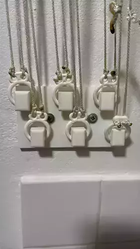 Wall mounted rack cable attachment base