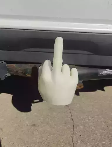 The Finger Trailer Hitch Cover