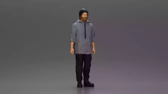 man wearing a hat hoodie stands confidently watching intently