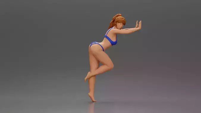 Woman in a bikini leaning on the car with her hands on the beach