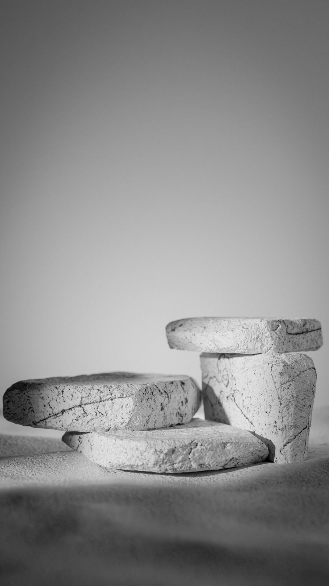 Two black containers on stone surface 3D model_8