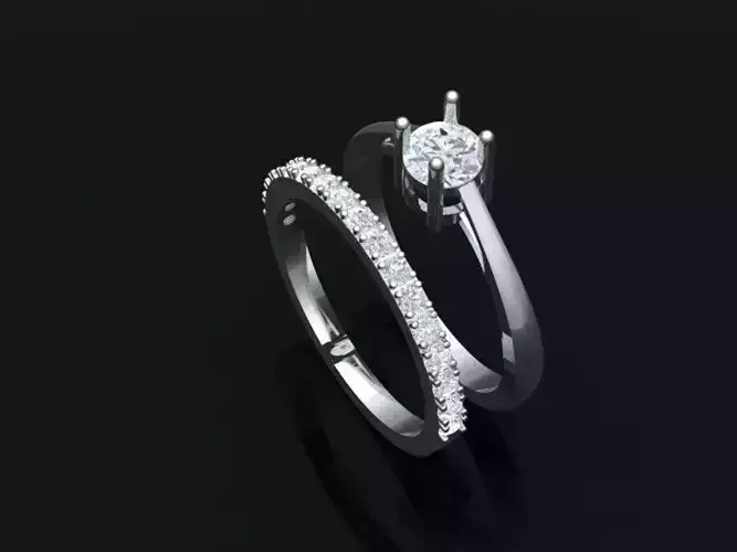 Solitair and Ring behind Round Stone