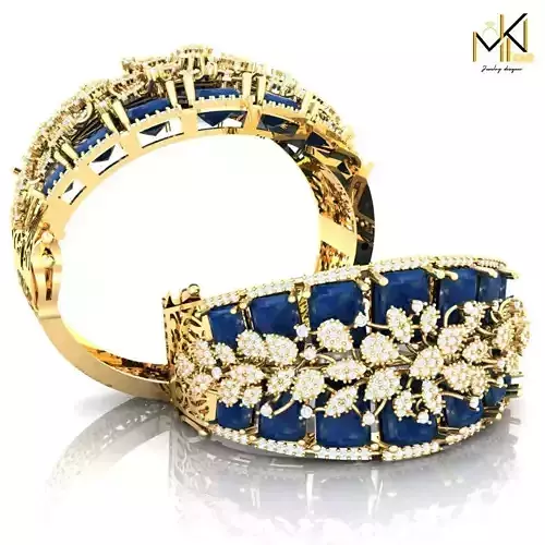 Gold bracelet adorned with blue gemstones and sparkling diamonds