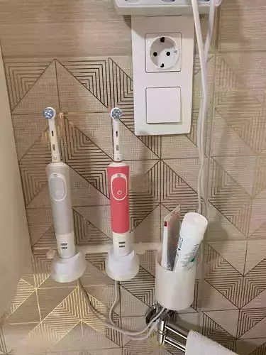 Oralb switch it variable wall mounted holder