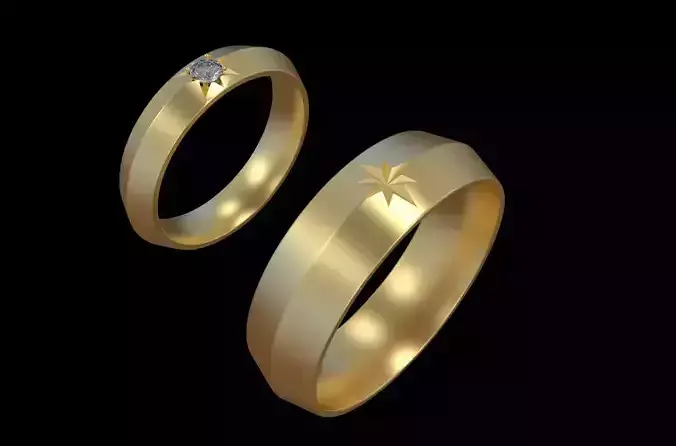 Wedding rings with stars and gem