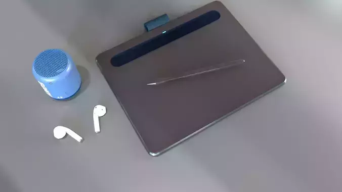 a total scene which have air pods  pen tablet  and speaker  3D model