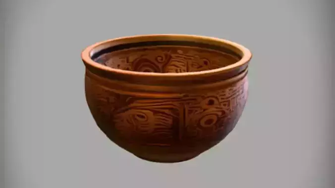 Intricately carved wooden bowl