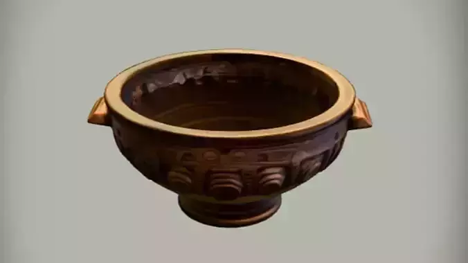 intricately carved wooden bowl