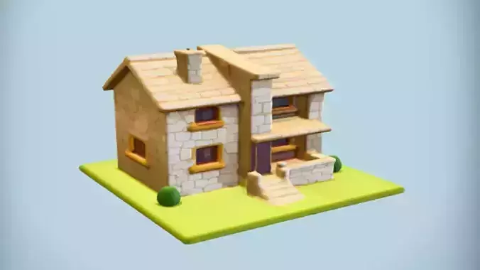 miniature stone house on grass base