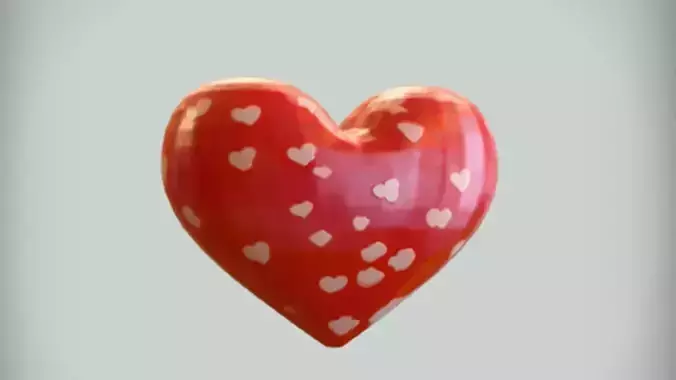 heart shaped pillow with polka dots