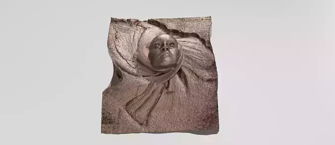Sand face sculpture