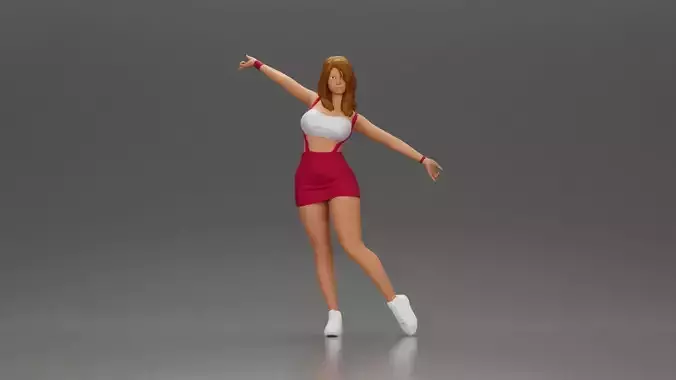 Dynamic woman striking a joyful pose in sporty red outfit