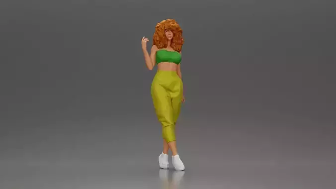 Curly-Haired Woman in Vibrant Green Outfit Striking a Pose