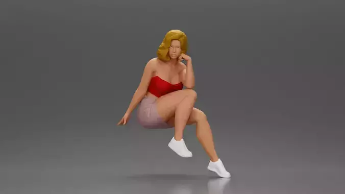 Confident Blonde Woman Sitting Gracefully in Red and Pink