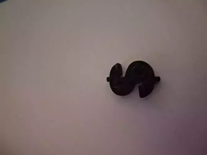  It is a pendant depicting a dollar