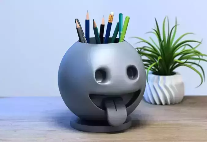 Emoji face with stuck out tongue Emoji pen holder