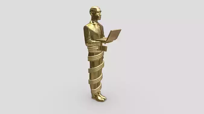 Small golden man statue in Russia holding a laptop