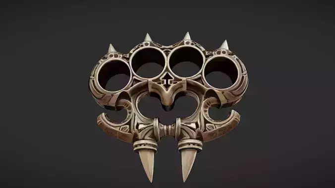 ornate brass knuckles with spikes