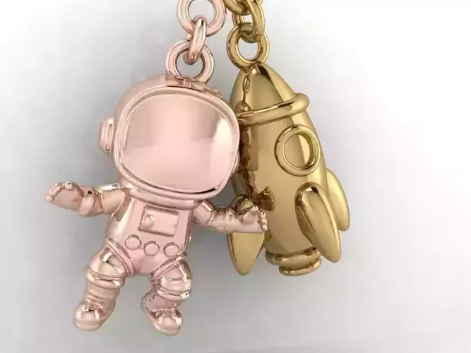 ASTRONAUT ROCKET CHARM PENDANT