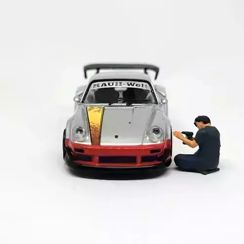 1-64 Scale Figure of Akira Nakai RWB Sitting Cross-Legged