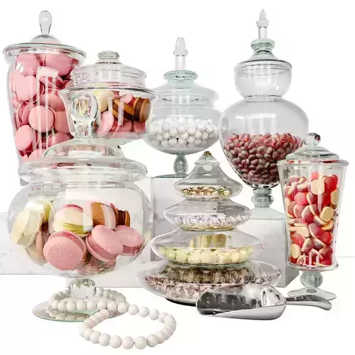 Set of macarons and cookies in beautiful vessels 
