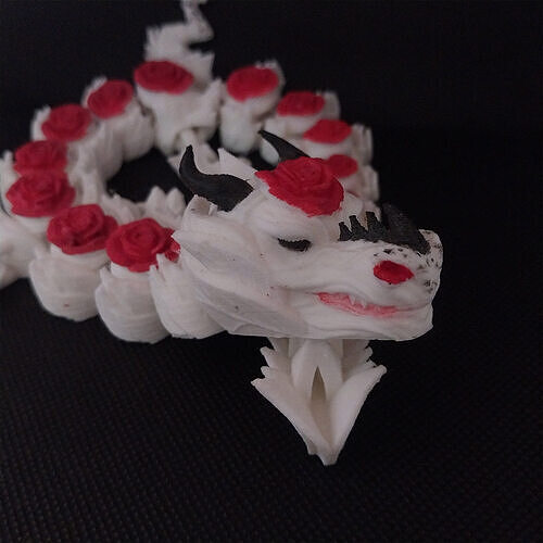 Rose Guardian Flexi Dragon  Articulated 3D print model Rose Guardian Flexi Dragon  Articulated 3D print model