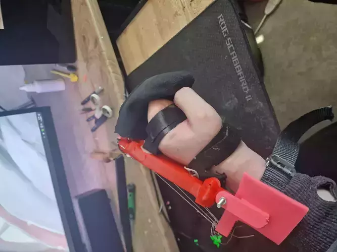 Wrist powered low cost prosthetic