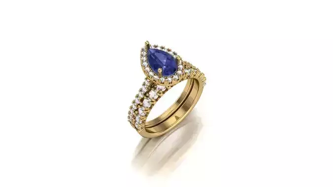 A Harmonious Union The Pear Tanzanite Halo Diamond Bridal Set