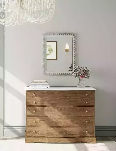 wooden dresser with four drawers
